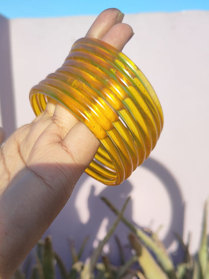 Yellow jelly bangles with ghungroo bangles